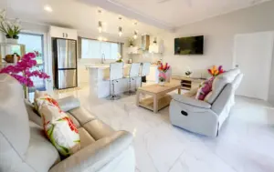 Interior open plan living area of one of the Itimarama Villas in Rarotonga