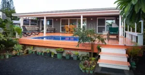exterior view of one of the Itimarama Villas, showing outdoor pool area